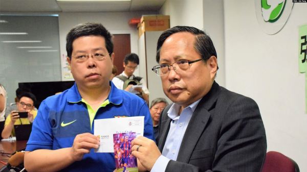 林子健（左）与香港支联会主席何俊仁