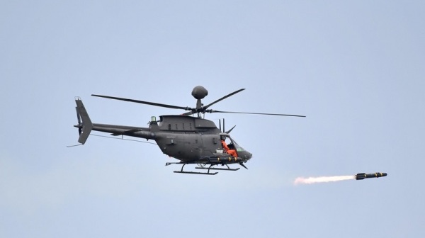 图为7月16日参加汉光演习“三军联合反登陆作战”操演的OH-58战搜直升机，此架直升机刚发射地狱火飞弹。