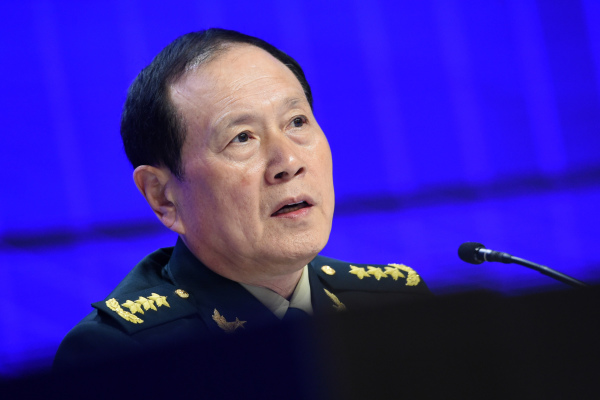 中共国防部长魏凤和。（图片来源：ROSLAN RAHMAN/AFP via Getty Images）
