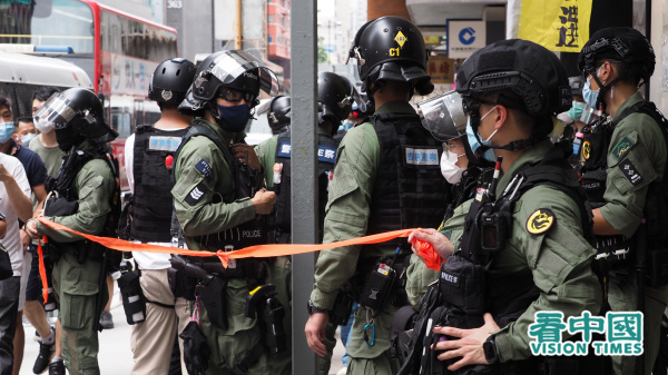 9月6日九龙大游行期间，港警暴力执法行动再次引发争议。（图片来源：李天正/看中国）