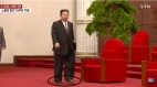 金正恩怪异穿着引揣测西装配凉鞋发表演说(图)