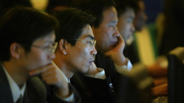 内蒙古自治区党委统战部原副部长王伟等中共官员被查。图为中共官员出席两会。（图片来源：FREDERIC J. BROWN/AFP via Getty Images）