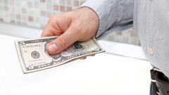 5元美金改变两个人的命运(图)