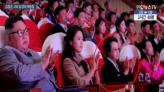 他处死丈夫金敬姬与金正恩6年后首度同坐(图)