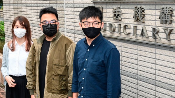 前香港众志的前秘书长黄之锋、前副秘书长周庭，以及前主席林朗彦因去年6月21日反送中活动包围警察总部一事，遭到判刑。