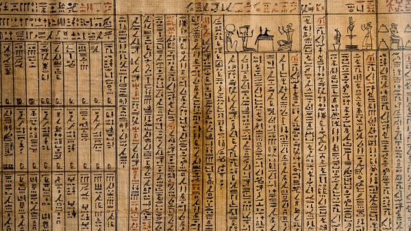 古埃及紙莎草紙文件上使用紅色和黑色的墨汁。（示意圖／圖片來源：Adobe Stock）