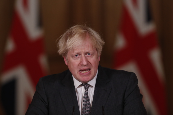 12月30日，英國總理約翰遜在一次虛擬新聞發布會上發表講話。
