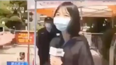 央视女记者采访社区自测体温高烧40度(视频图)
