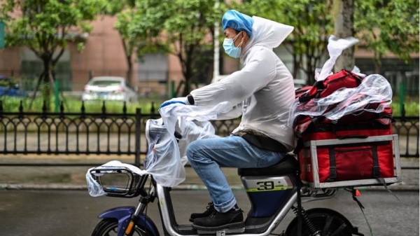 武漢肺炎 （|图片来源: HECTOR RETAMAL/AFP via Getty Images）