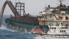 4年查扣的15艘陆方非法抽砂船海巡：卖不掉就击沉(图)