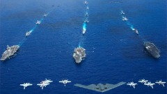 明居正：中国对台动武将触发美中断交(图)