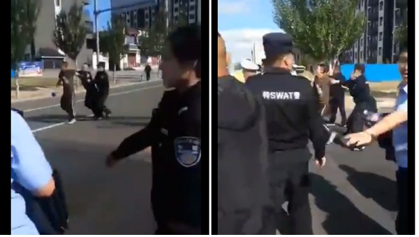 警察在内蒙古街头抓捕、殴打抗议民众。