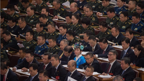 中共官員參加會議。