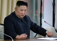 一國二制金正恩奢華風與朝鮮「時尚警察」(圖)
