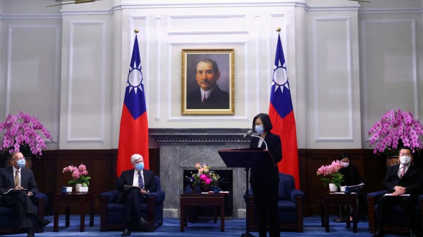 Taiwan President Tsai Ing-wen (centre R) speaks at a meeting with former US Senator Chris Dodd and the US delegation at the presidential office in Taipei on April 15, 2021.(16:9)