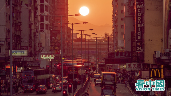 香港黄昏日落街景。（图片来源：庞大卫/看中国）