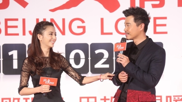 佟麗婭和陳思誠於2013年11月19日星期二在香港出席《北京愛情故事》新聞發布會。